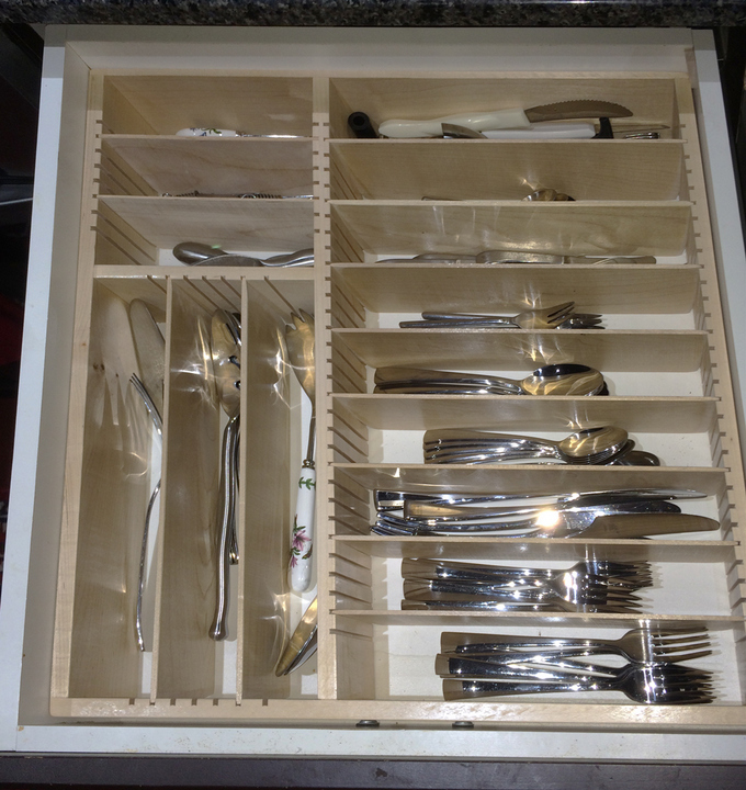 wood drawer insert in white kitchen cabinets